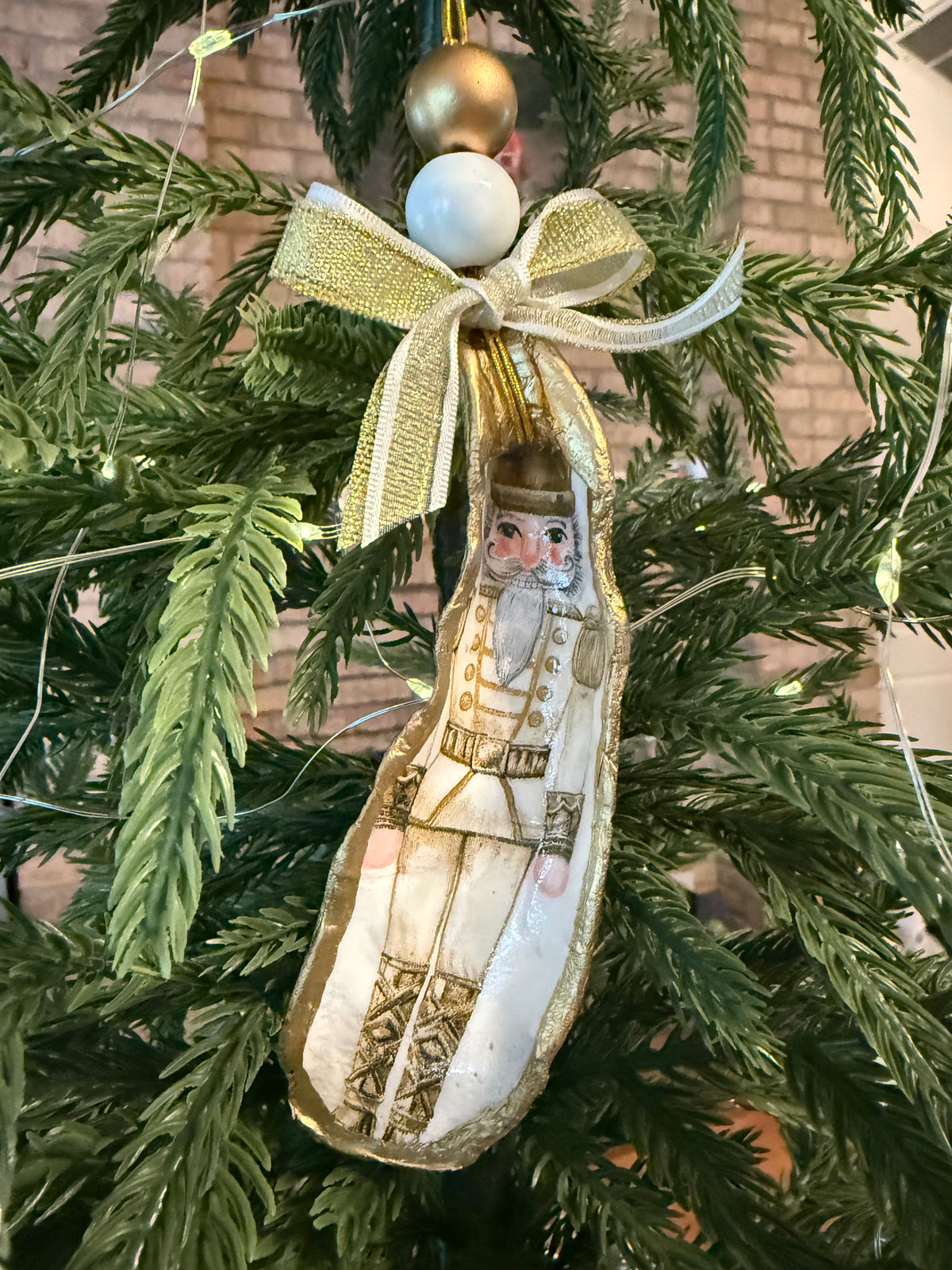 Large Nutcracker Ornament (Gold) 2