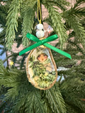 Small Girl with Tree Ornament