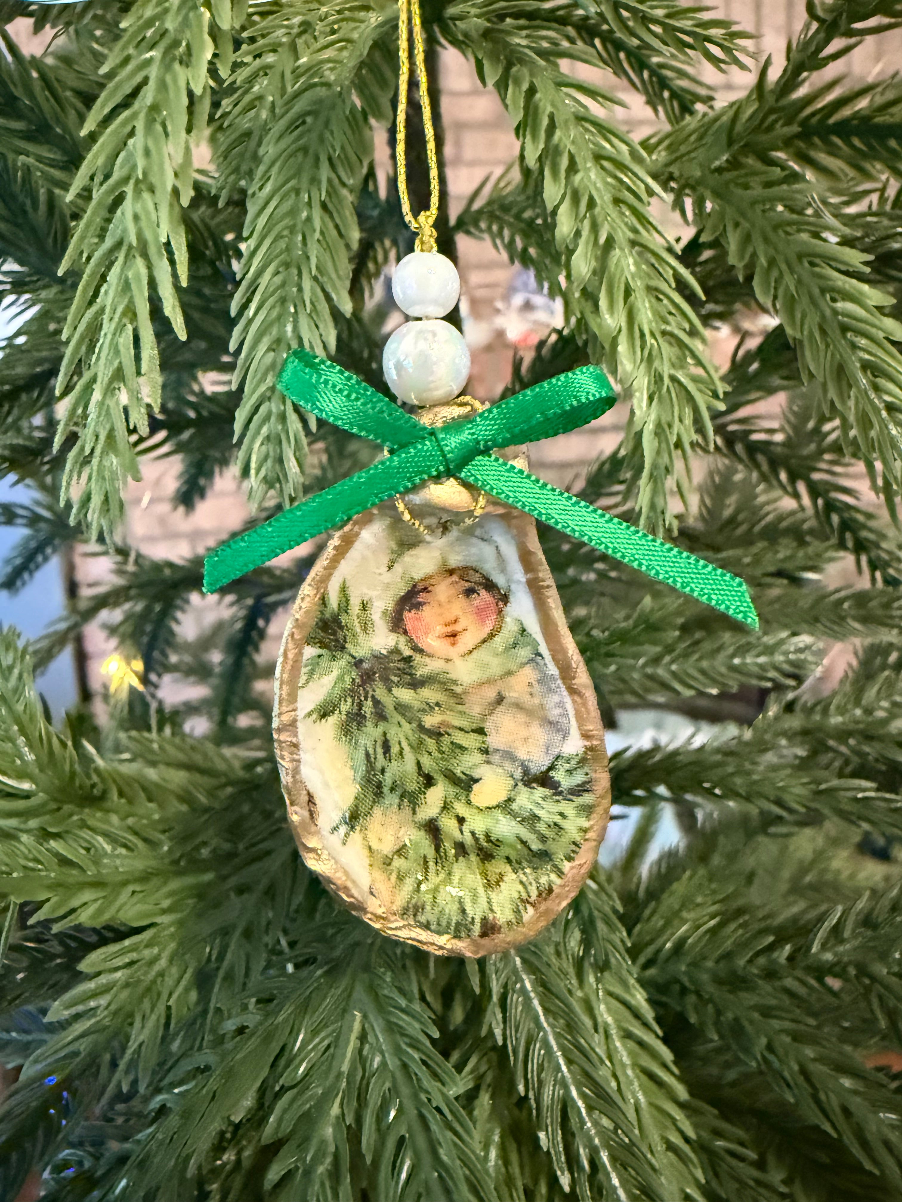 Small Girl with Tree Ornament