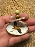 Small Flying Bird Ornament 1